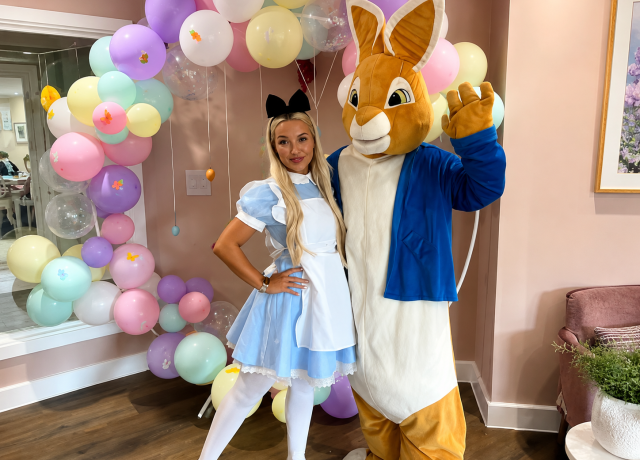 Easter entertainers dressed as Alice in Wonderland and the White Rabbit at Meadows Park Care Home in Louth.